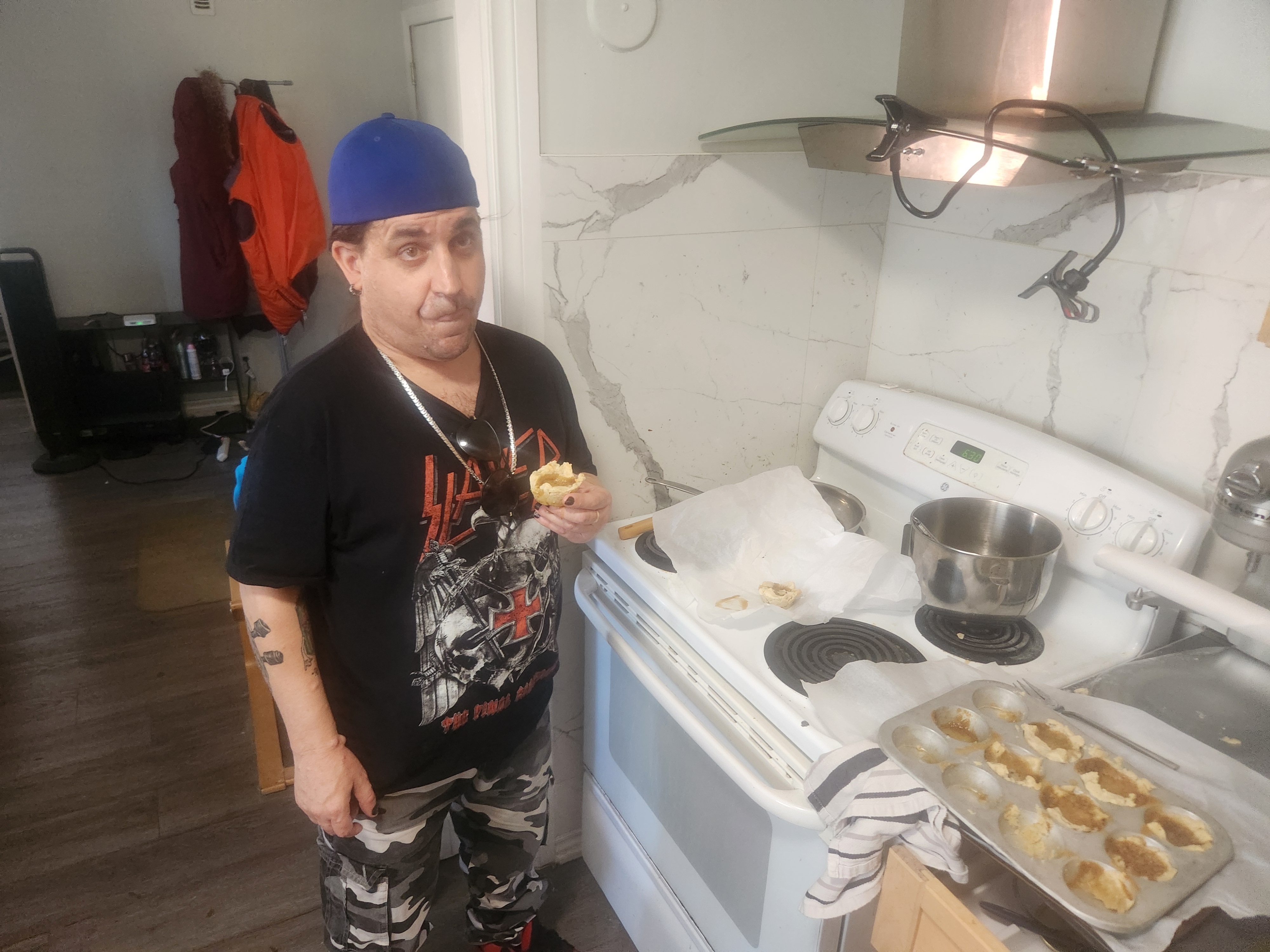 Beans holding a fresh butter tart